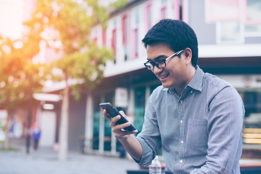 boy using his phone